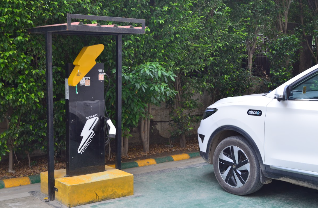 A charging cable connected to an electric car