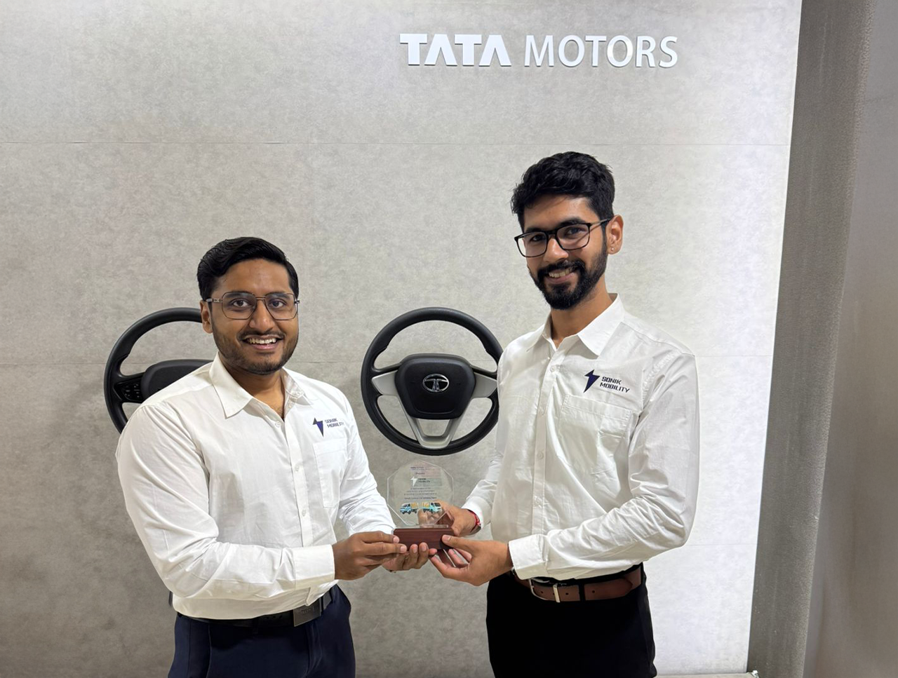 The Sonik Mobility team collaborating on EV charging technology